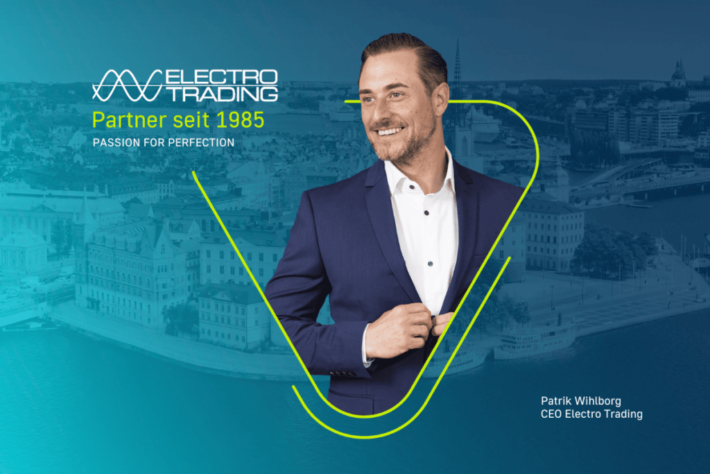 Partner Portraitbild von Patrik Wihlborg, der einen blauen Anzug trägt und lächelt