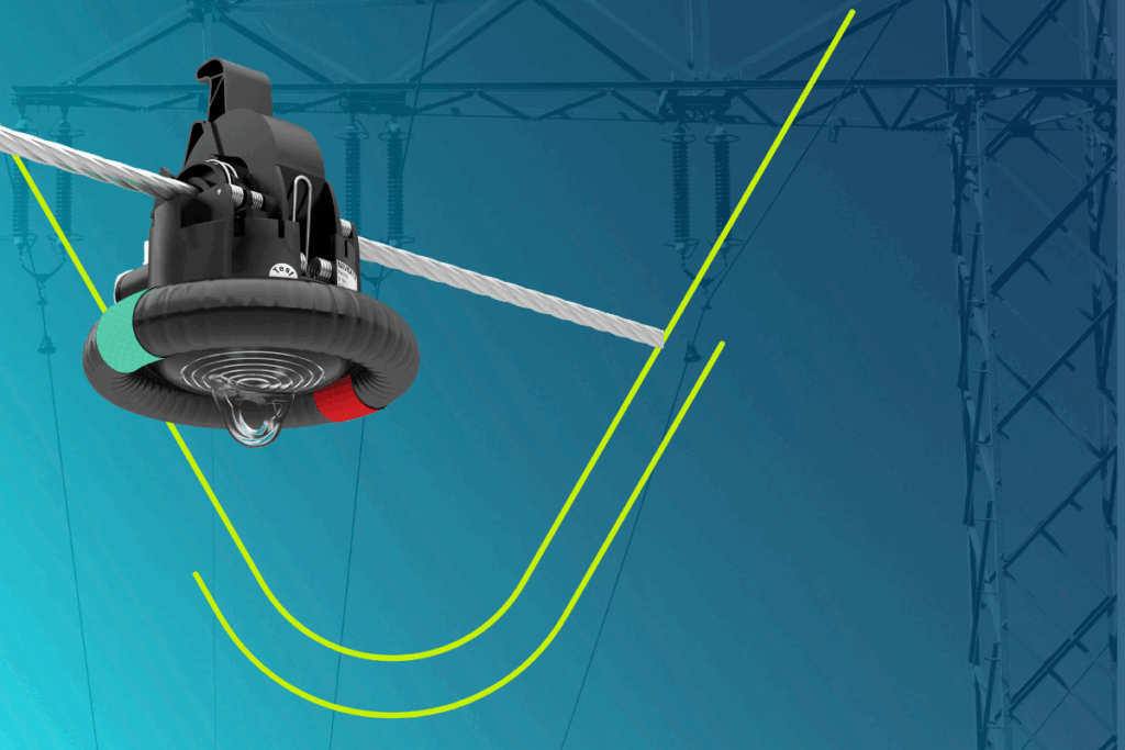 Smart Navigator 2.0 HV im Vordergrund, ein Hochspannungsmast im Hintergrund