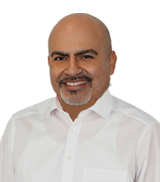 Male employee in white shirt in portrait shot